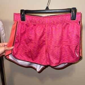 Pink and orange athletic shorts